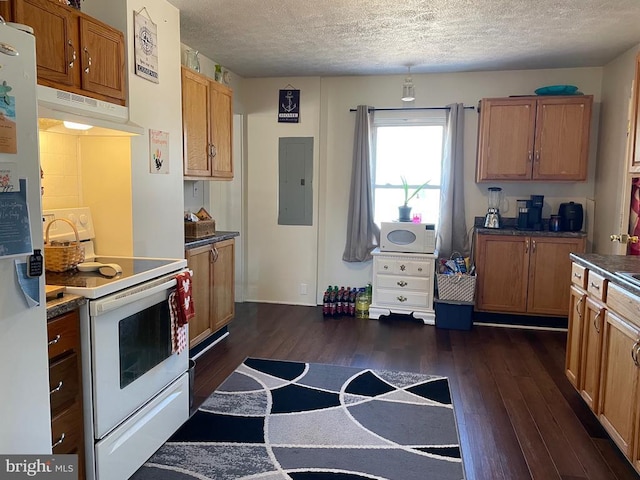 kitchen with dark wood-type flooring, a textured ceiling, white appliances, electric panel, and under cabinet range hood