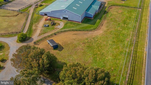 birds eye view of property featuring a rural view