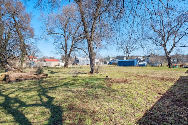 view of yard with fence