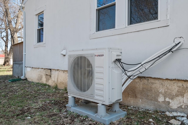 details with ac unit and stucco siding