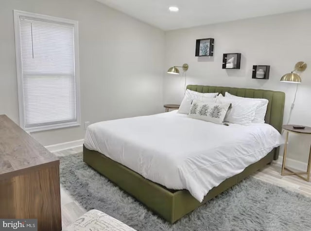 bedroom with recessed lighting and baseboards