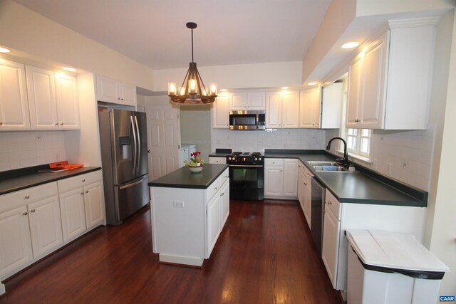 dining space with dark hardwood / wood-style floors and a chandelier