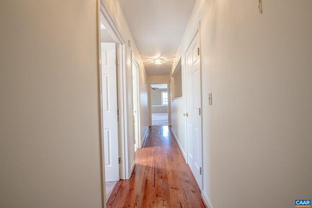 bedroom featuring crown molding, light colored carpet, and ceiling fan