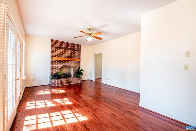 entryway with wood-type flooring and a high ceiling