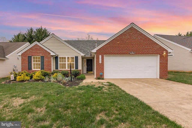 ranch-style home featuring an attached garage, brick siding, a yard, and driveway