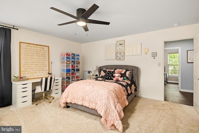 bedroom with baseboards, carpet, and ceiling fan