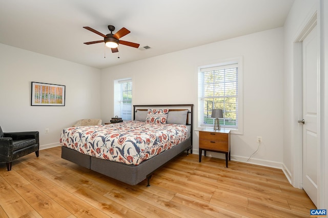 bedroom featuring ceiling fan and light hardwood / wood-style flooring