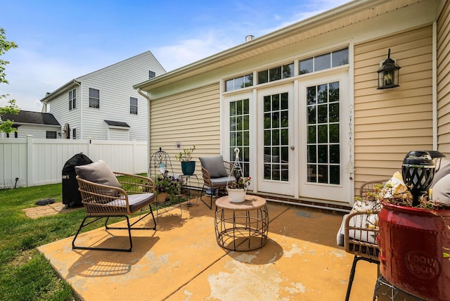 view of patio with fence and french doors