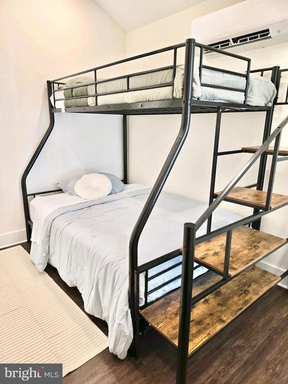 bedroom featuring hardwood / wood-style floors