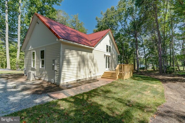 view of home's exterior featuring a lawn