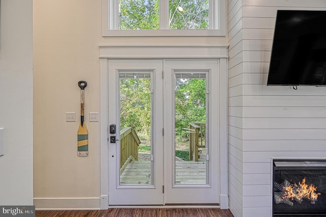 doorway to outside featuring dark hardwood / wood-style floors