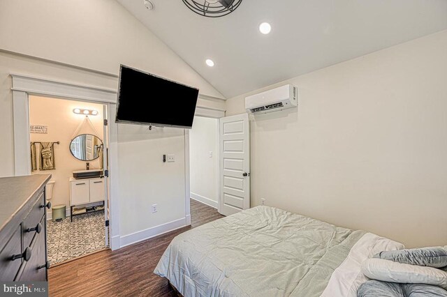 bedroom with dark hardwood / wood-style flooring, vaulted ceiling, and a wall mounted AC