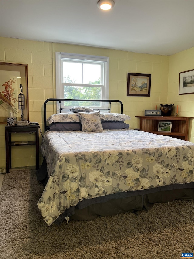 bedroom featuring carpet