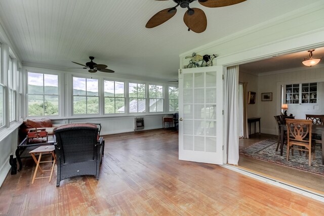 sunroom / solarium with heating unit