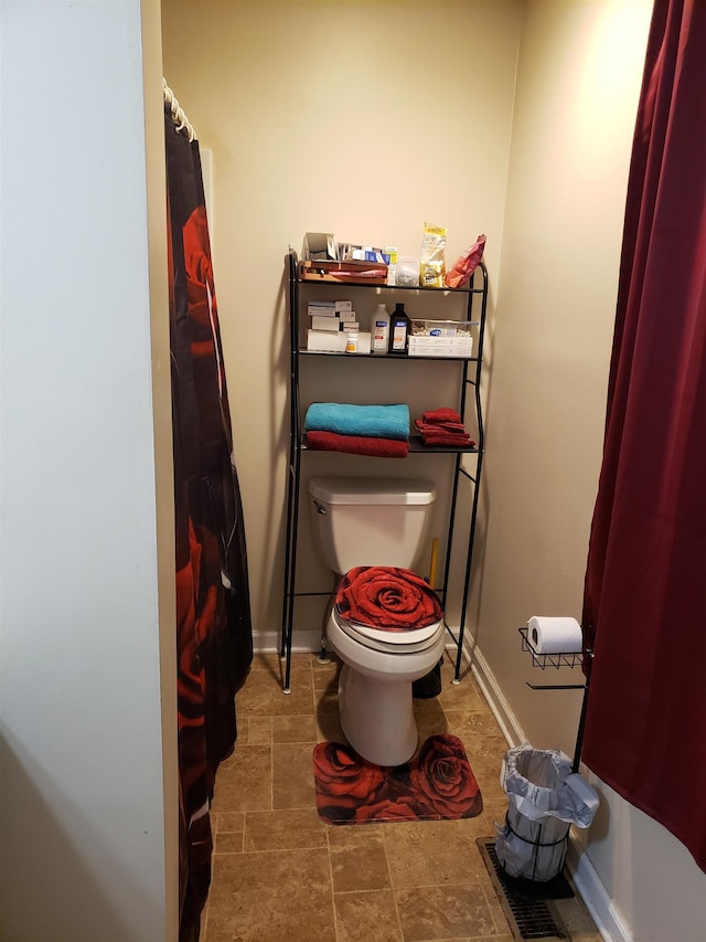 bathroom featuring toilet