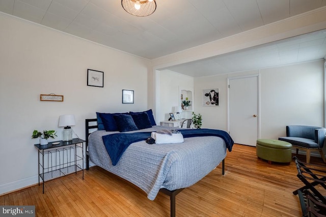 bedroom with light wood-type flooring