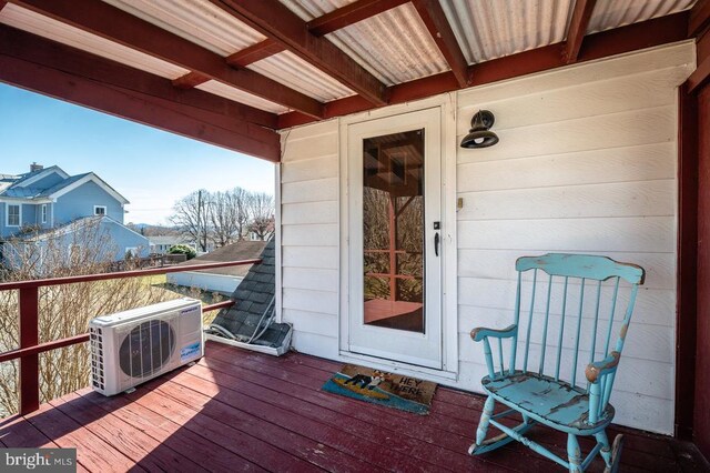 wooden terrace with ac unit