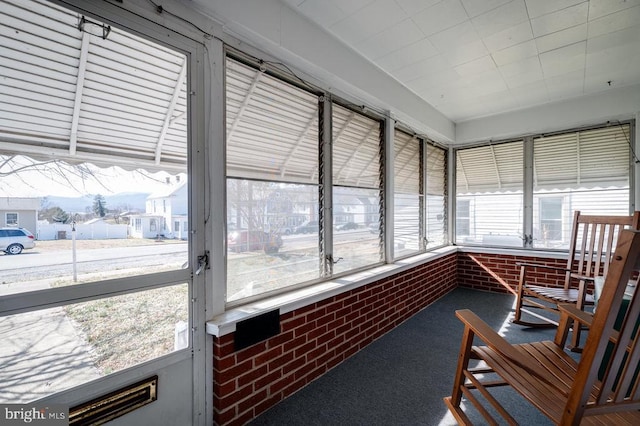 sunroom / solarium with a wealth of natural light