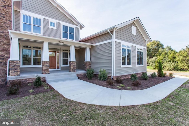 craftsman-style house with covered porch