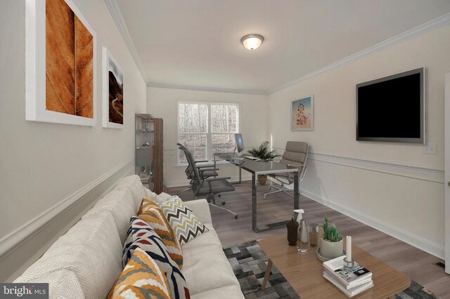 living room with ornamental molding and hardwood / wood-style floors