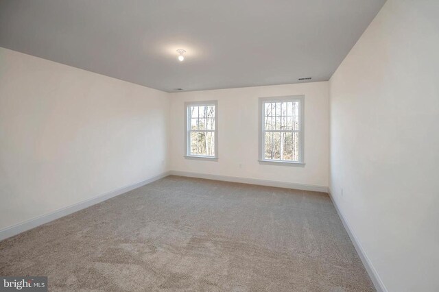 view of carpeted spare room