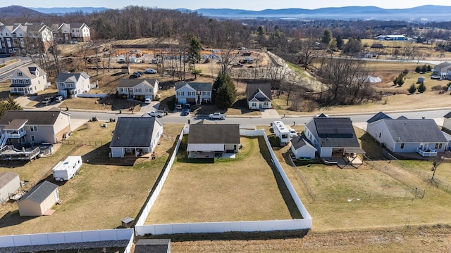 drone / aerial view featuring a mountain view and a residential view