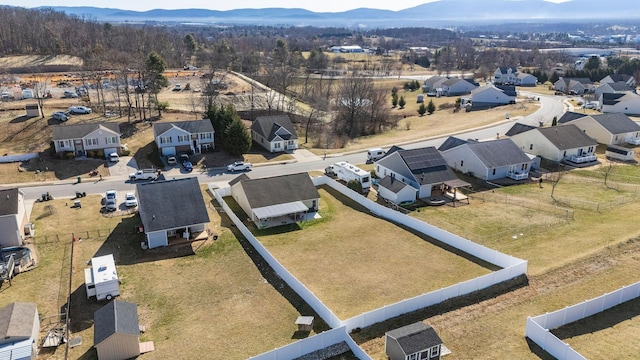 drone / aerial view with a mountain view and a residential view