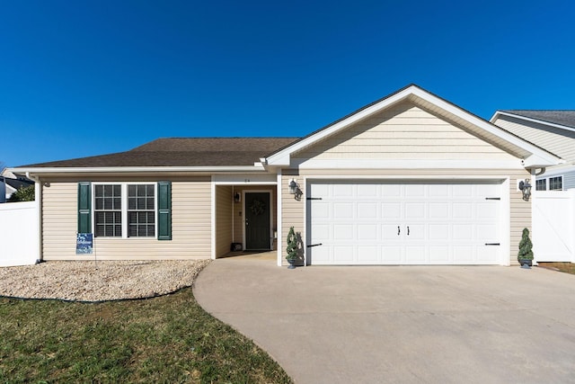 single story home with concrete driveway, a garage, and fence