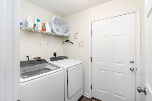 washroom with laundry area and separate washer and dryer