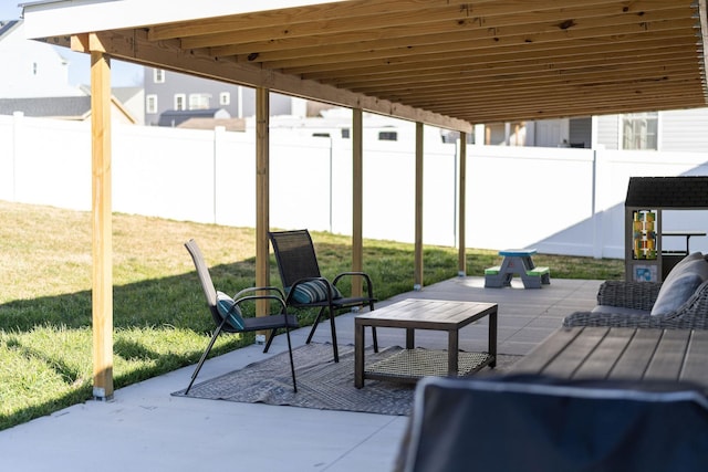 view of patio featuring a fenced backyard