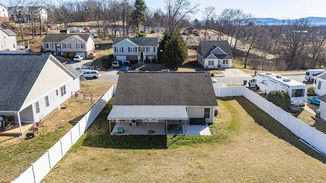 aerial view featuring a mountain view and a residential view