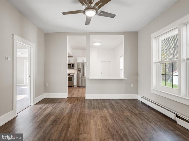 unfurnished living room featuring ceiling fan, a baseboard radiator, and dark hardwood / wood-style flooring