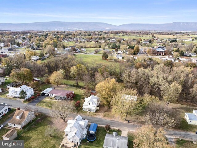 drone / aerial view featuring a mountain view