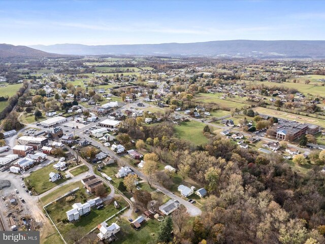 birds eye view of property with a mountain view