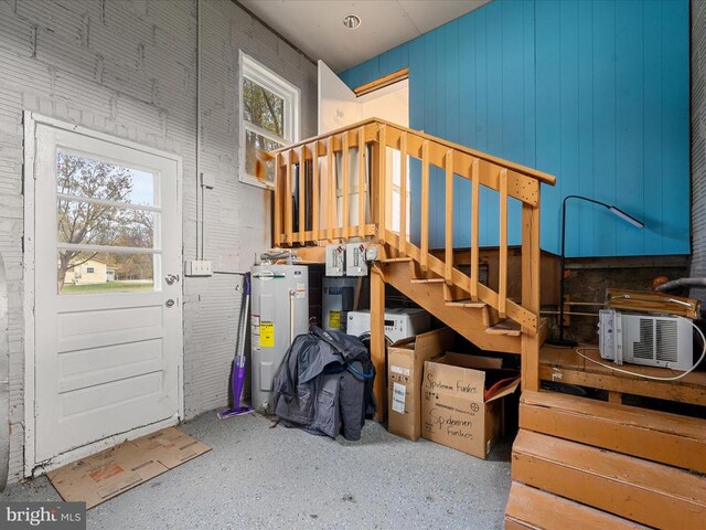 interior space with plenty of natural light and water heater