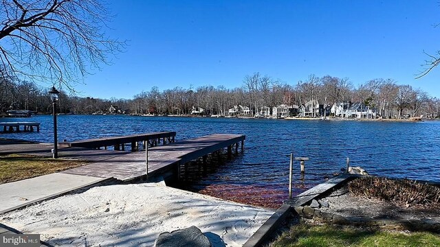 view of dock with a water view