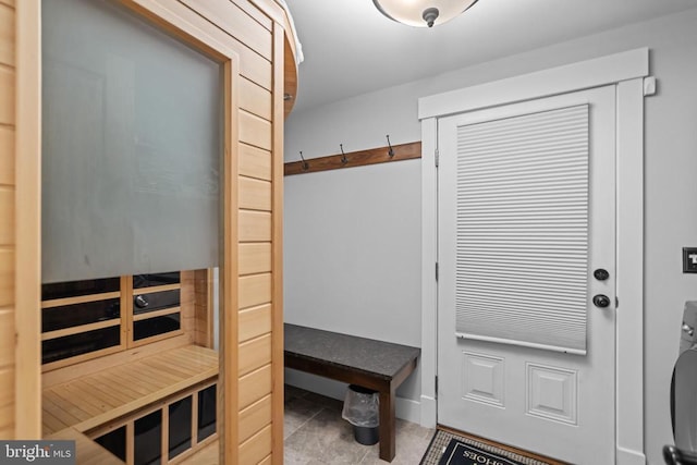 mudroom with light tile patterned flooring