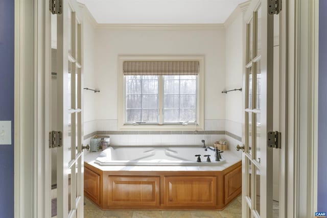 full bathroom featuring french doors, a garden tub, and crown molding