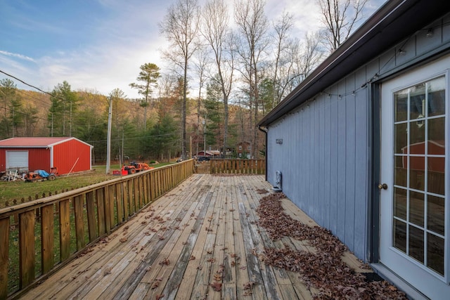 deck with an outdoor structure