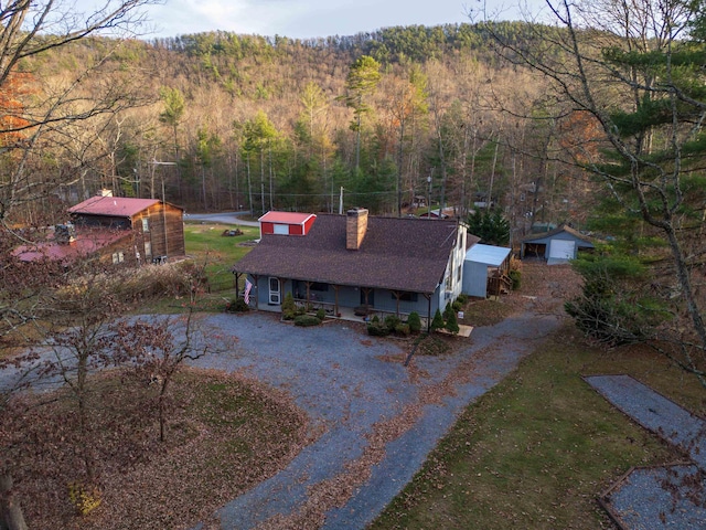 bird's eye view with a forest view