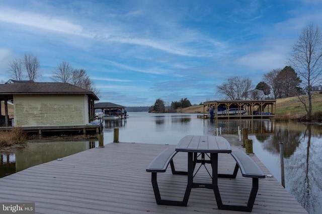 view of dock with a water view