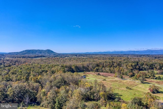 mountain view featuring a view of trees