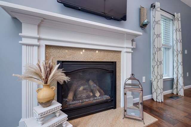 interior details featuring hardwood / wood-style floors