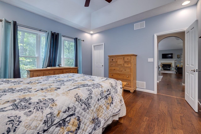 bedroom featuring dark hardwood / wood-style flooring and ceiling fan