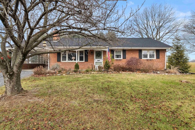 ranch-style house with a front yard