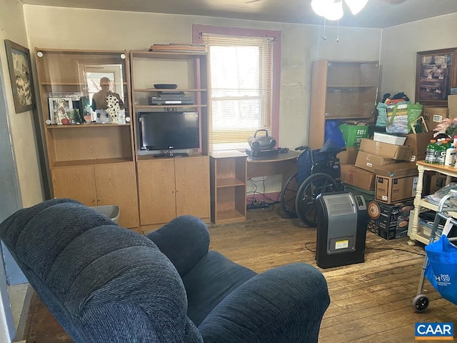 living room with wood finished floors