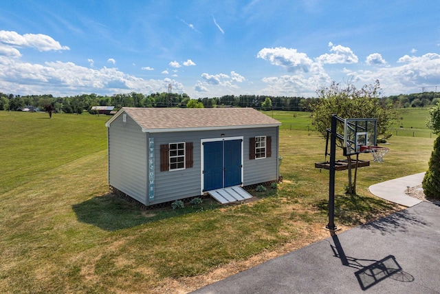 view of shed featuring a rural view