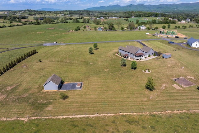birds eye view of property featuring a rural view and a mountain view