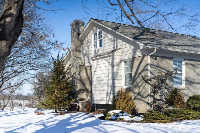 view of snow covered property