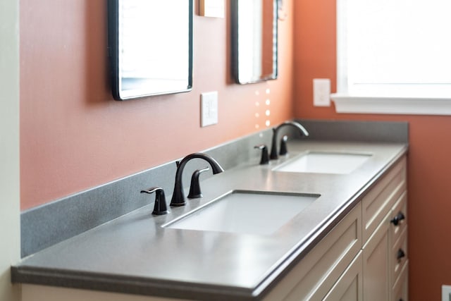 bathroom featuring vanity and plenty of natural light